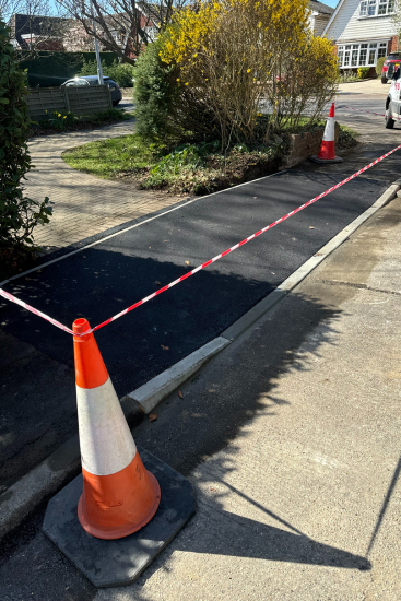 Drop Kerb With Organge Traffic Cone